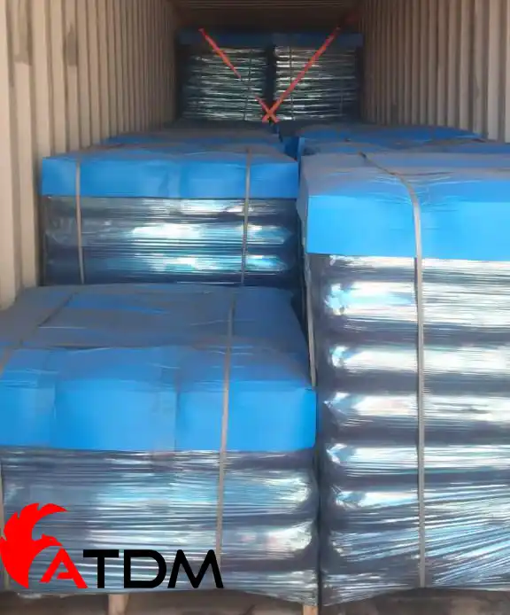Gilsonite for cementing packed in shrink-wrapped pallets with blue tops, ready for export by ATDM — used in oil well cement and drilling fluids.