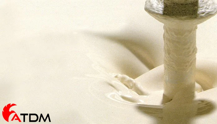 Limestone powder slurry during industrial mixing process for construction and chemical applications